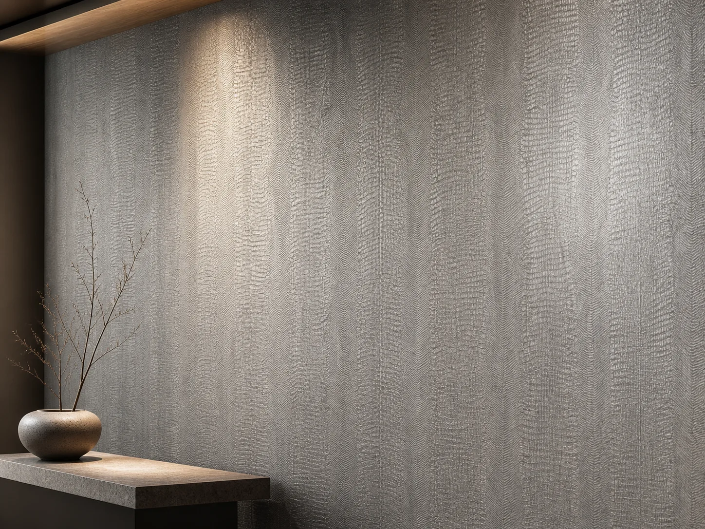 Textured wallcovering installed edge to edge in a hallway with a console table and framed art