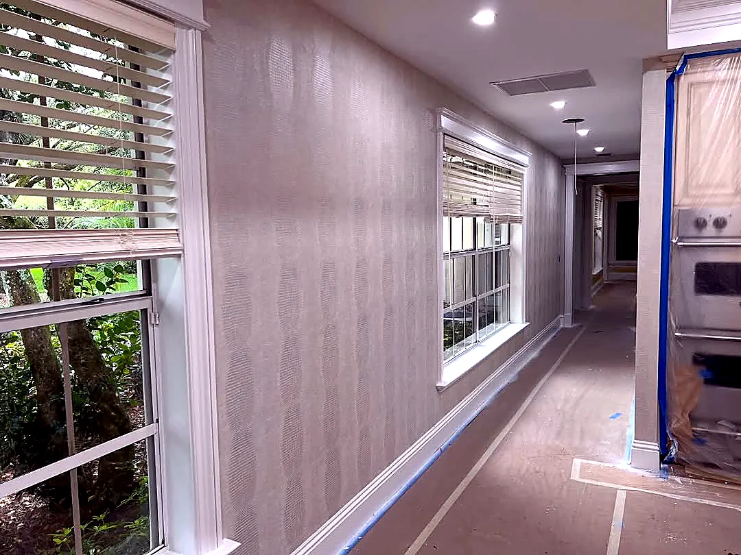 Soares Wallcovering jobsite in progress with floors fully protected